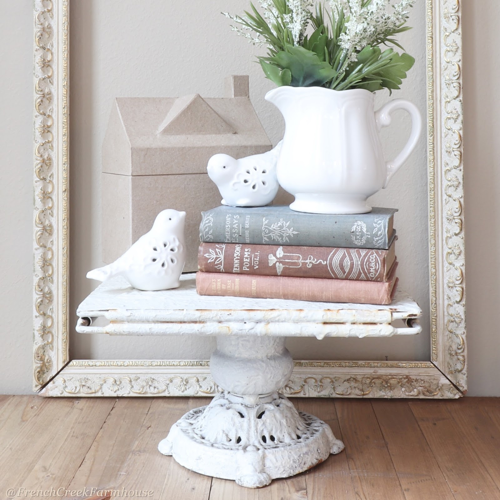 A vignette of books and vintage decor