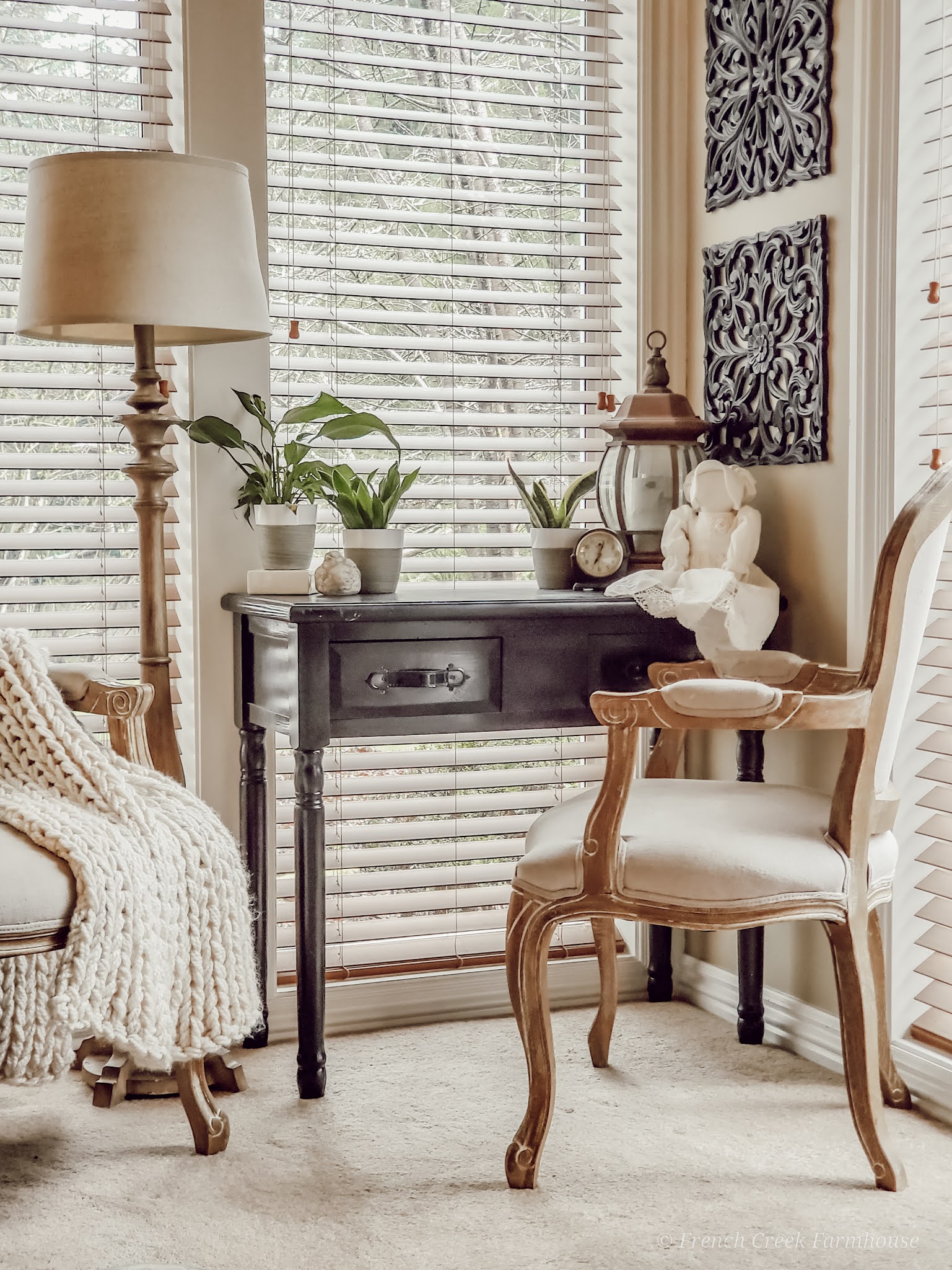 French country writing desk in front of window