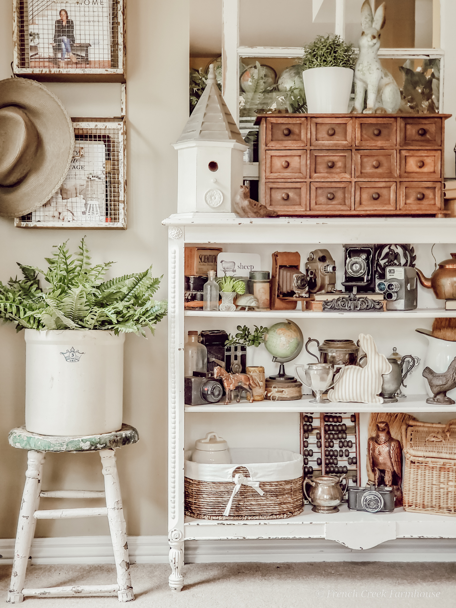 Vintage farmhouse shelves displaying antique finds