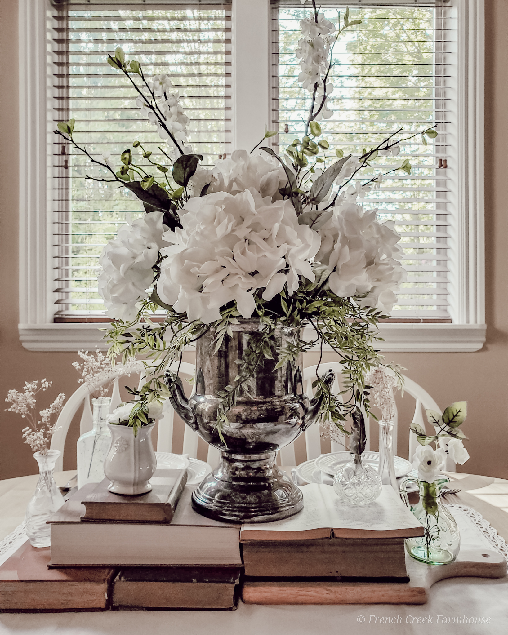 Vintage Spring Tablescape Hydranges in a vintage victory cup champagne bucket