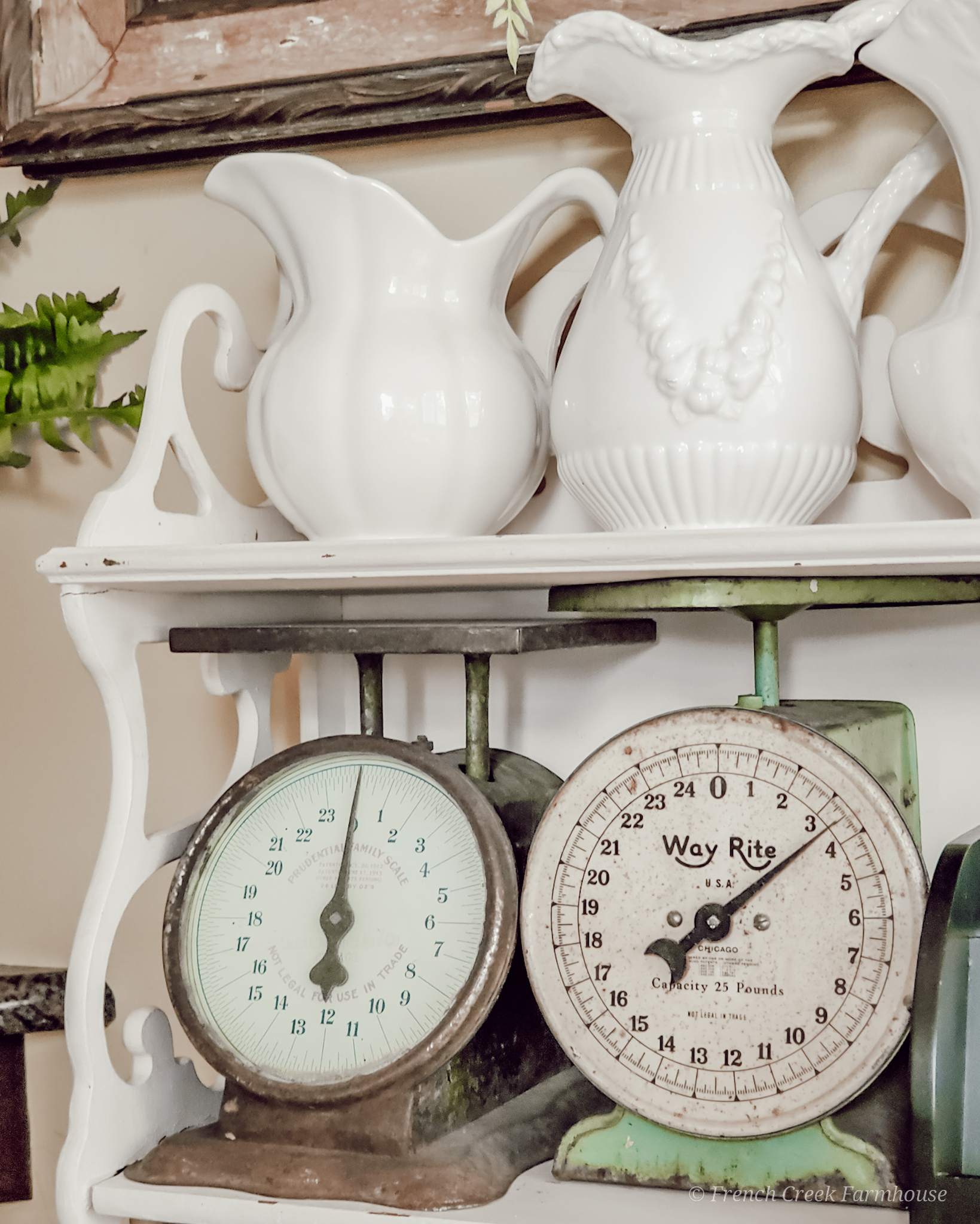 Vintage Spring Tablescape Vintage kitchen scales and ironstone vases on a chippy shelf