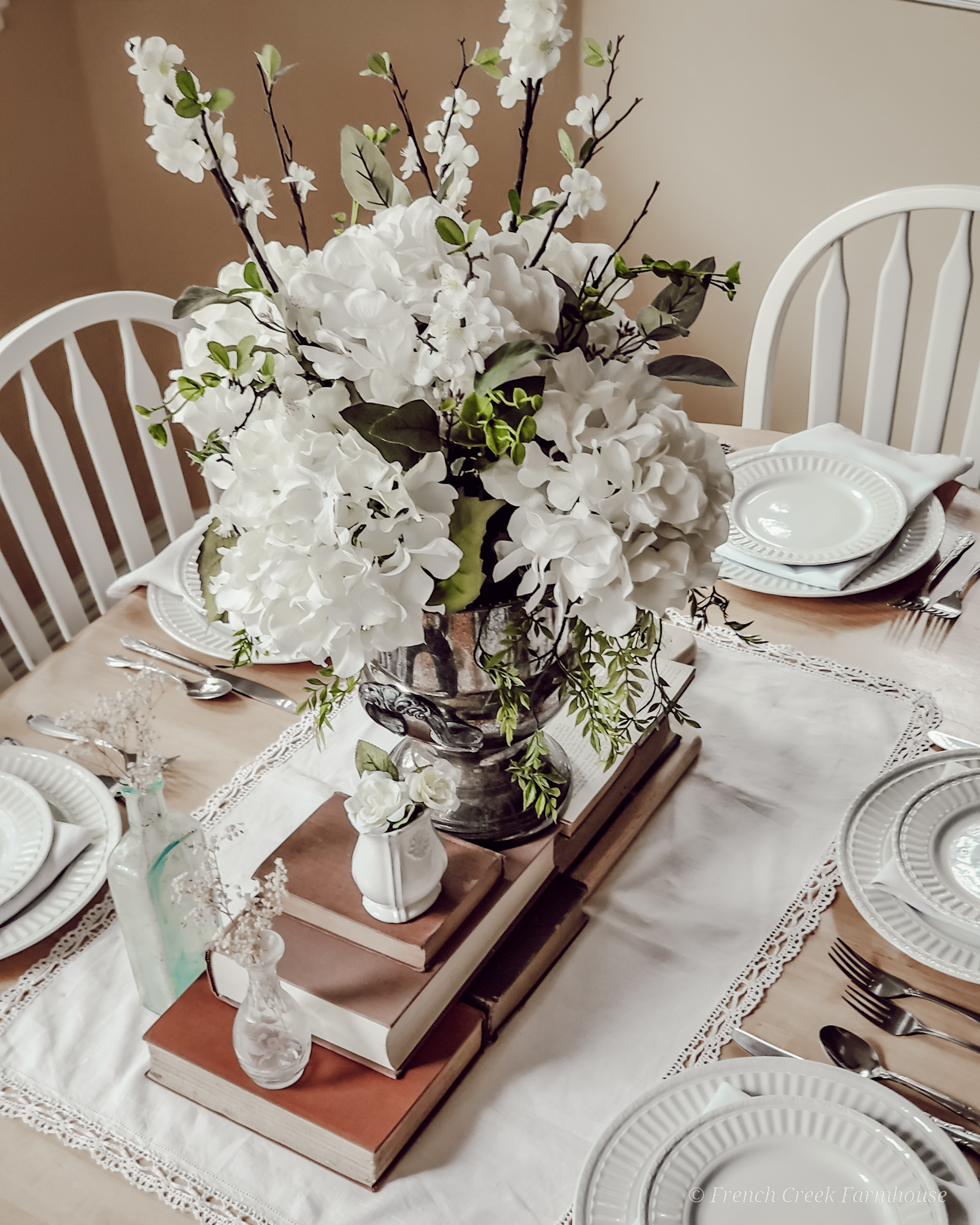 Vintage Spring Tablescape A vintage centerpiece with old books