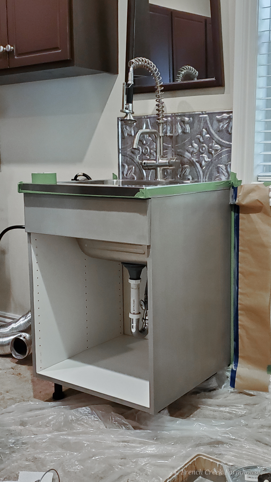 DIY Farmhouse Laundry Room Sink Cabinet