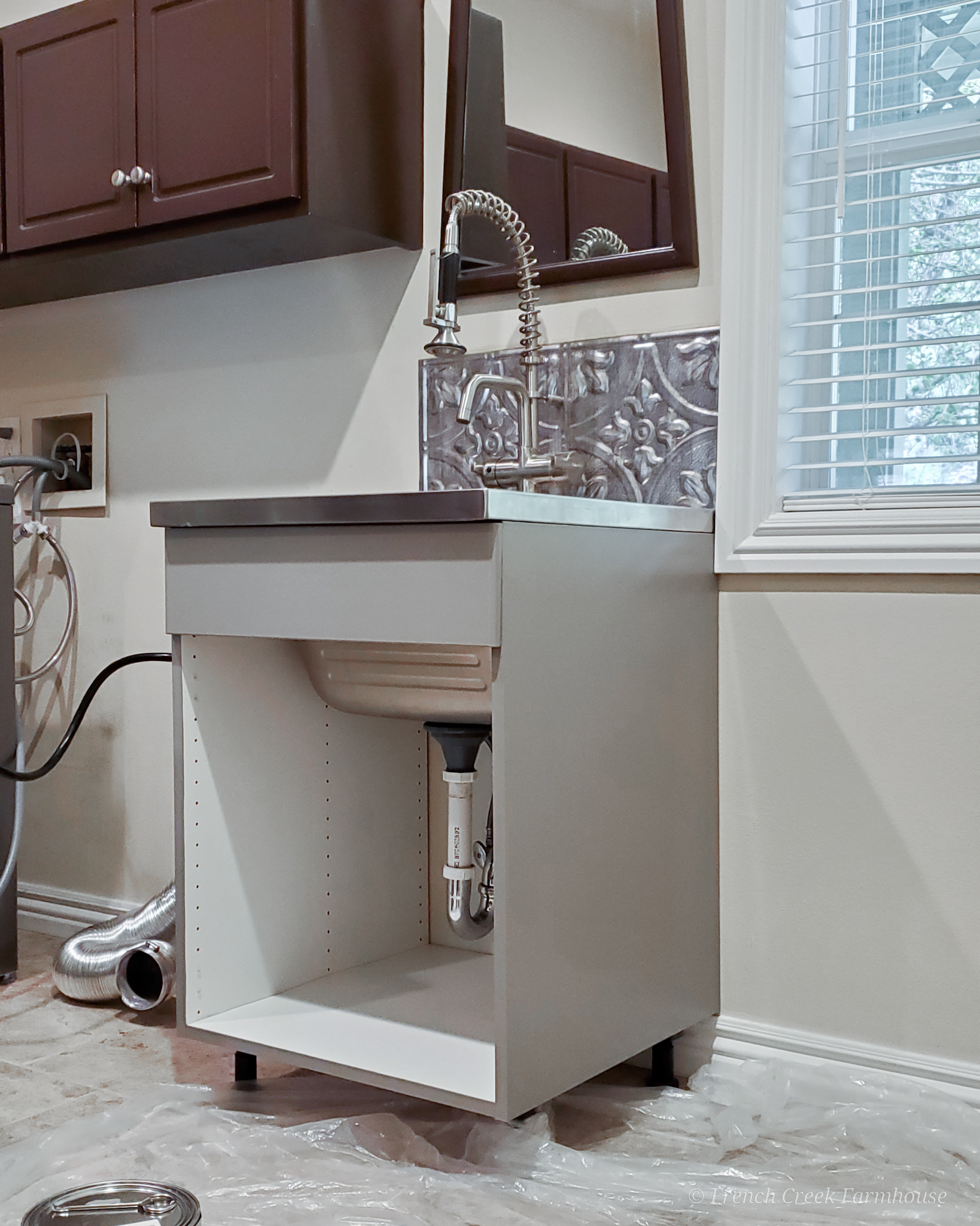 Laundry Room Renovation Painting our utility sink cabinet