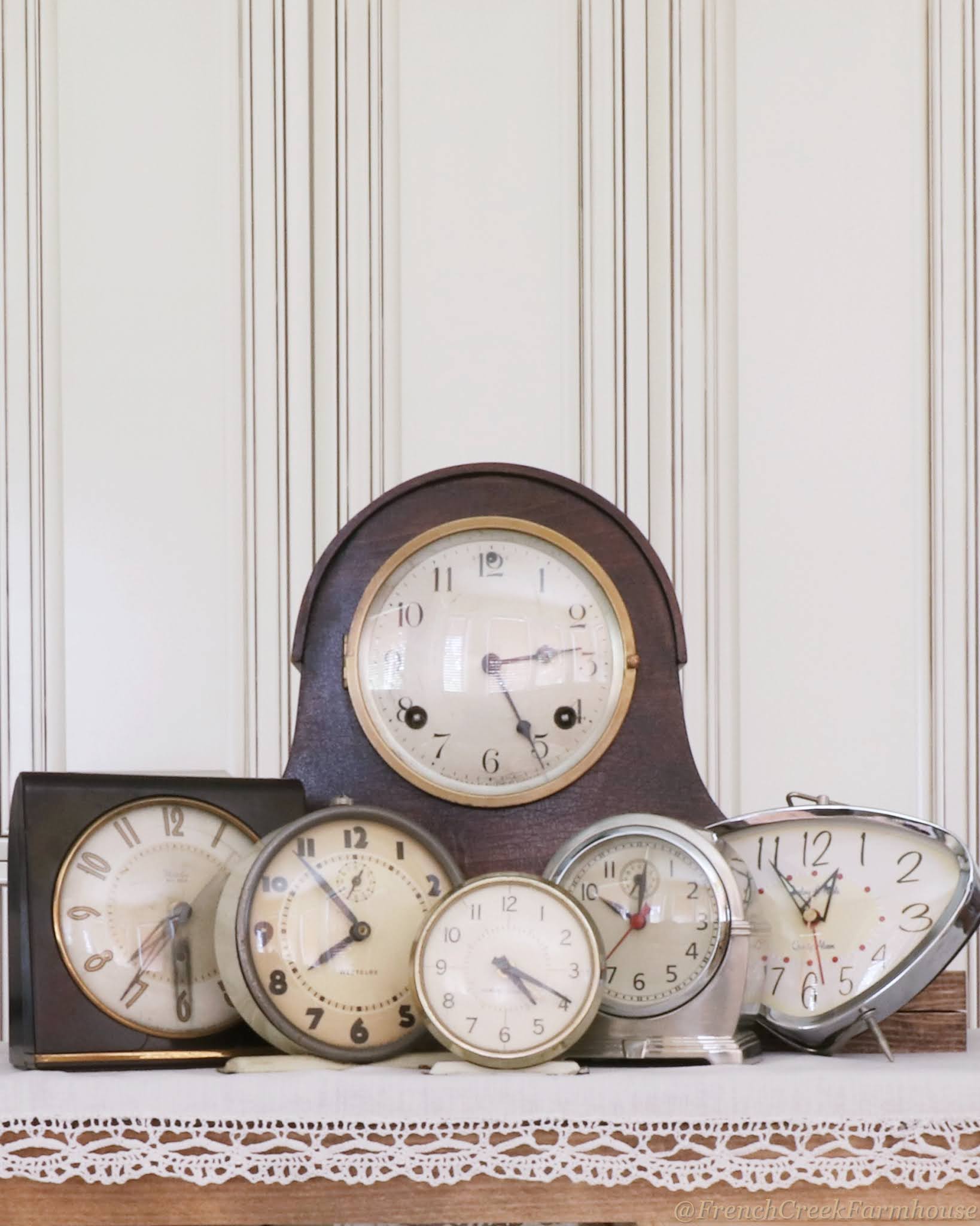 A collection of vintage clocks will make a statement in your neutral decor