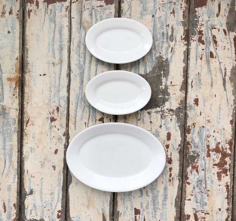 25 of the most beautiful pieces of farmhouse and vintage decor for your woods and whites design aesthetic