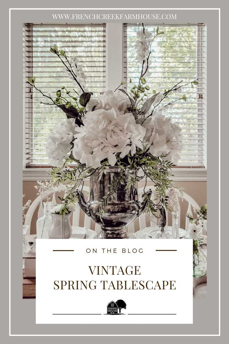 Our spring home tour continues with a vintage inspired tablescape