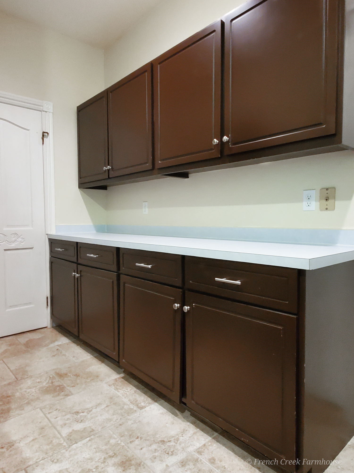 Cabinet Makeover: Before & After Before: Our plain brown cabinets and laminate countertops