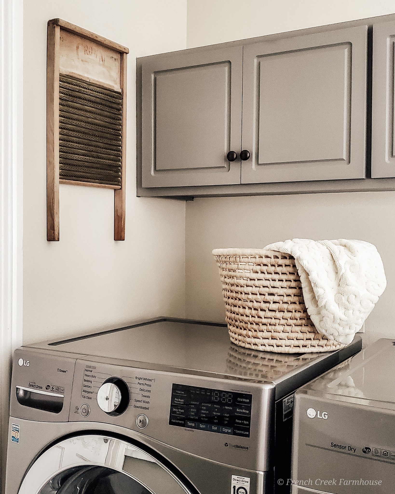 We added a vintage washboard as wall decor to our laundry room