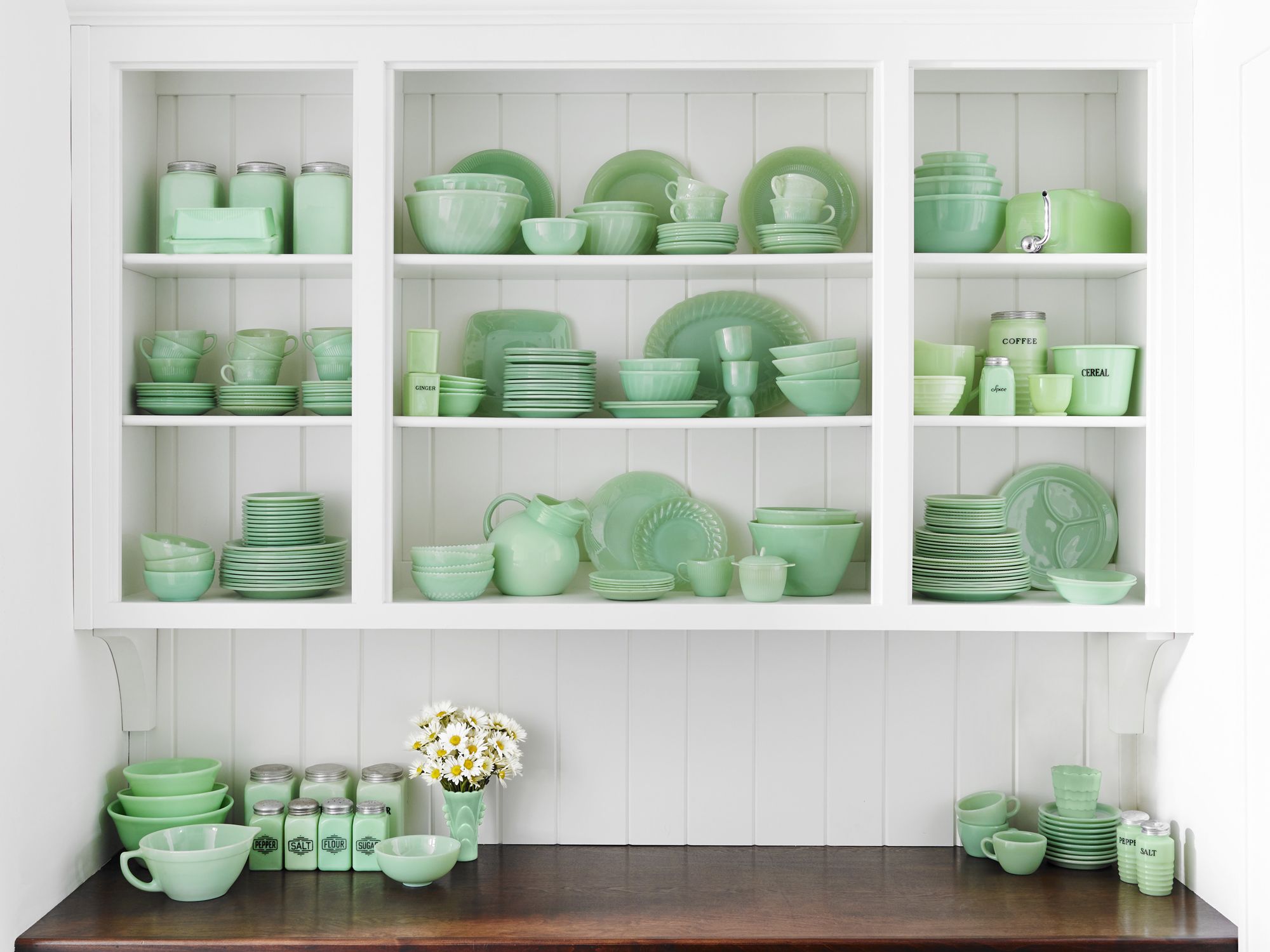 An amazing vintage jadeite collection in hutch cabinet