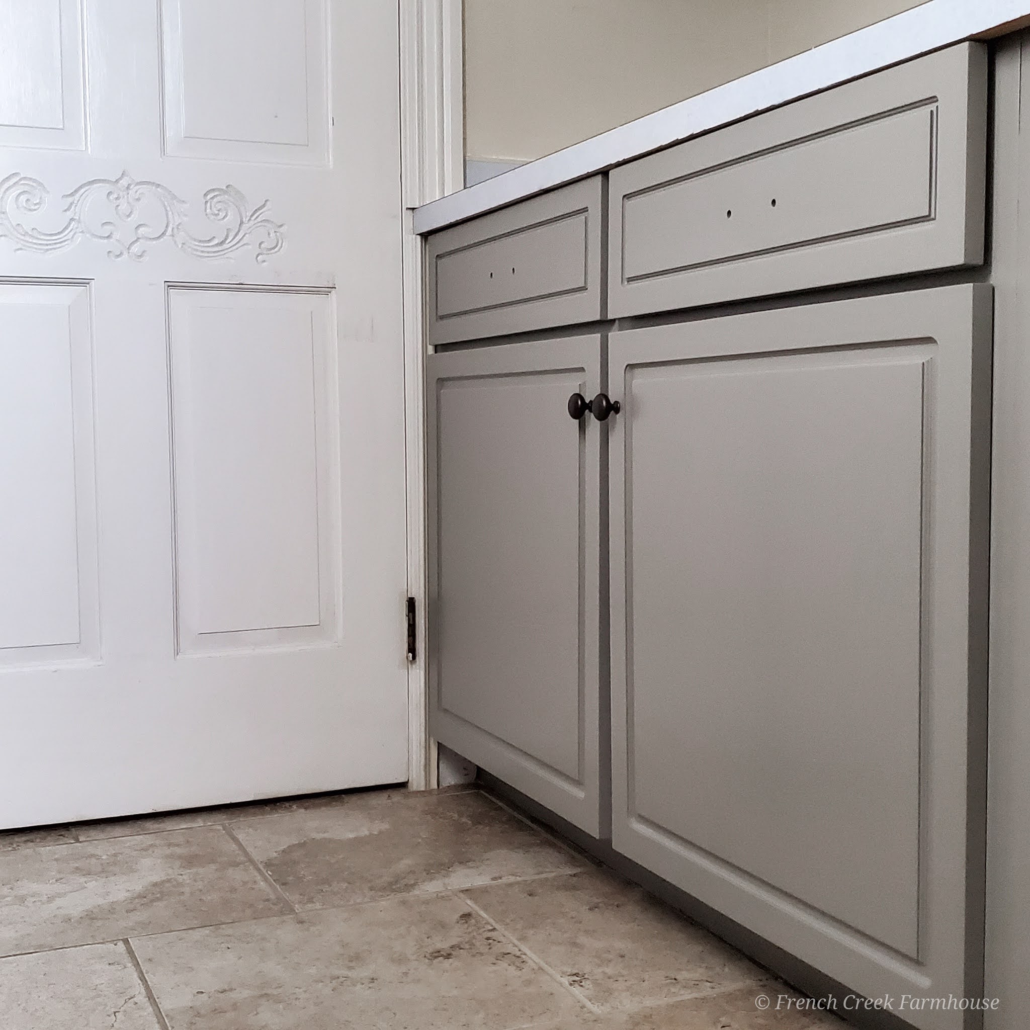 Painting our laundry room cabinets