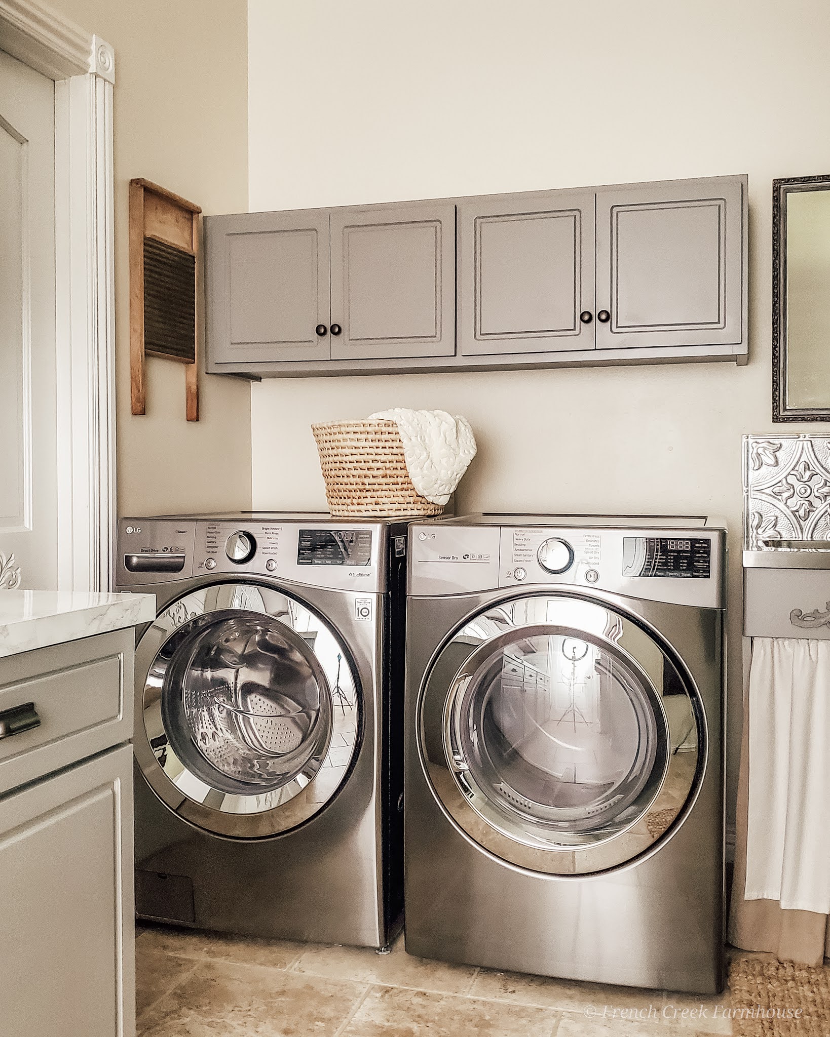 Decorating with vintage items adds a true farmhouse feeling to our laundry room