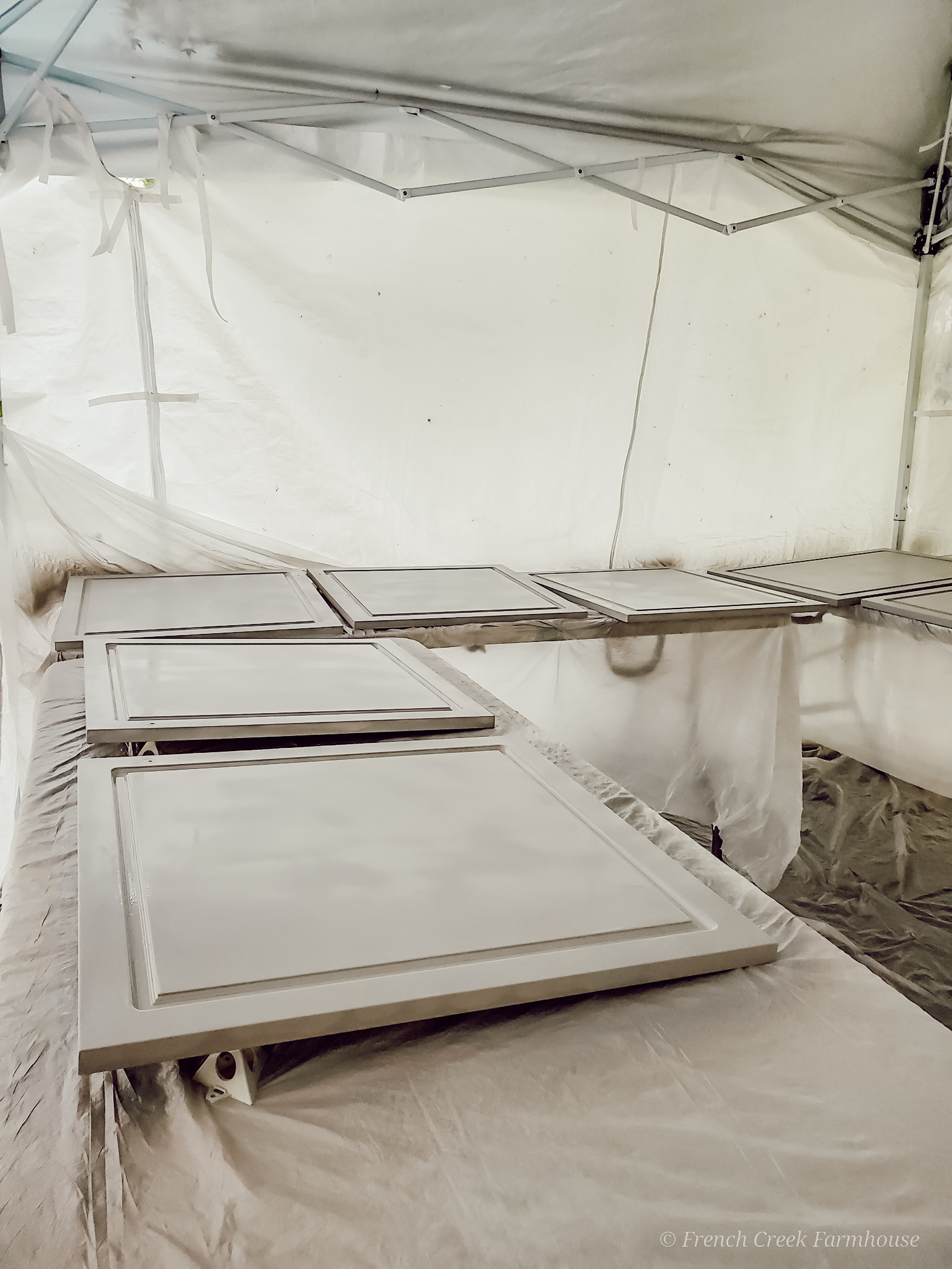 A pop-up canopy tent makes for an easy paint booth