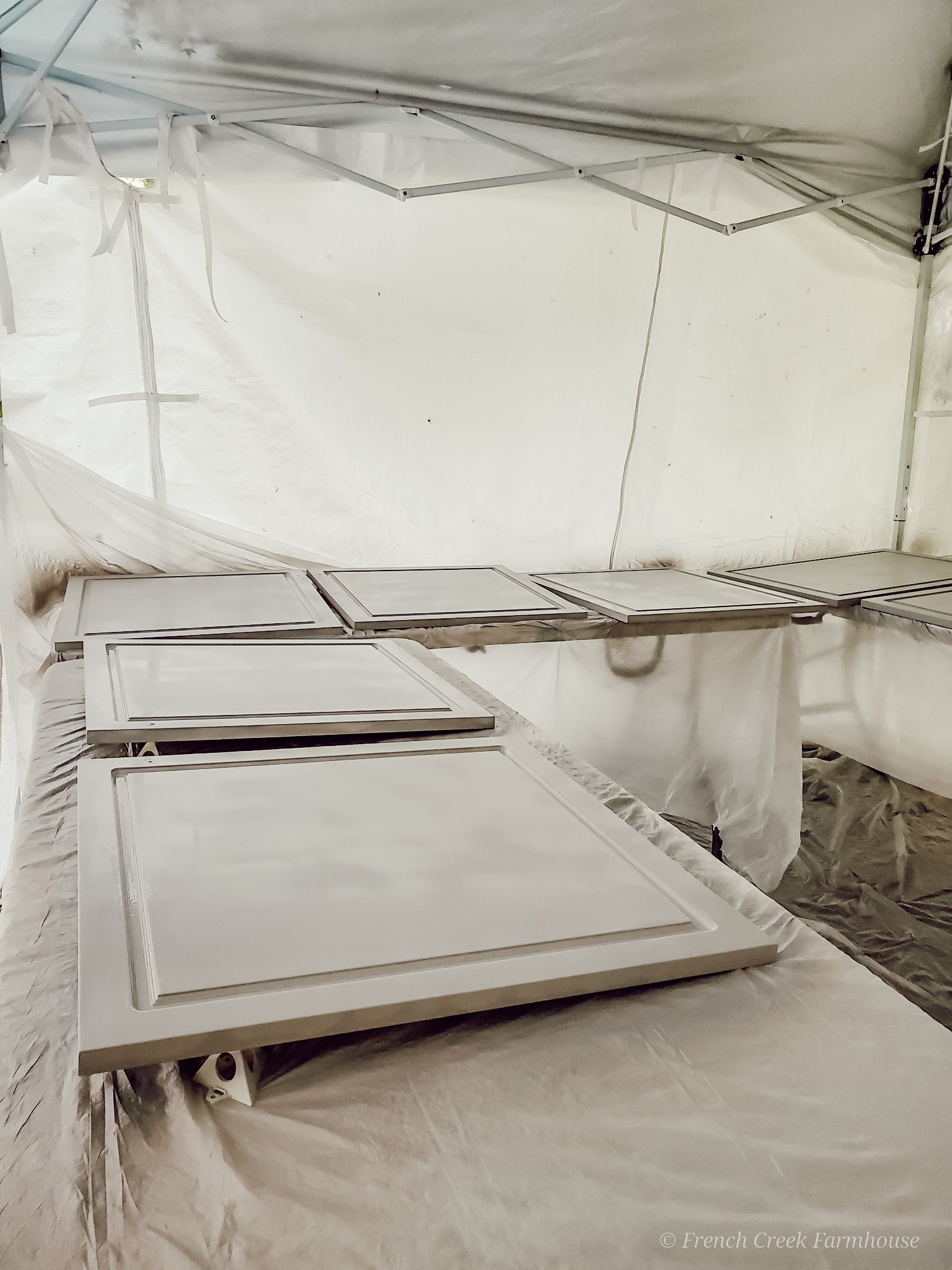 Painting Cabinet Doors A pop-up canopy tent makes for an easy paint booth