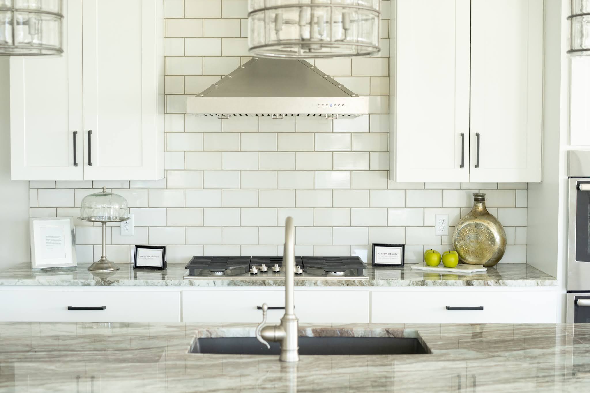 A tile backsplash is one way to add rhythm and repetition