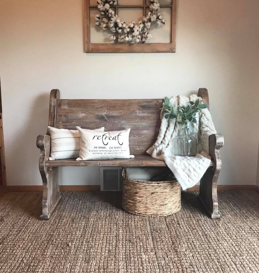 A church pew makes a great entryway bench in the vintage aesthetic