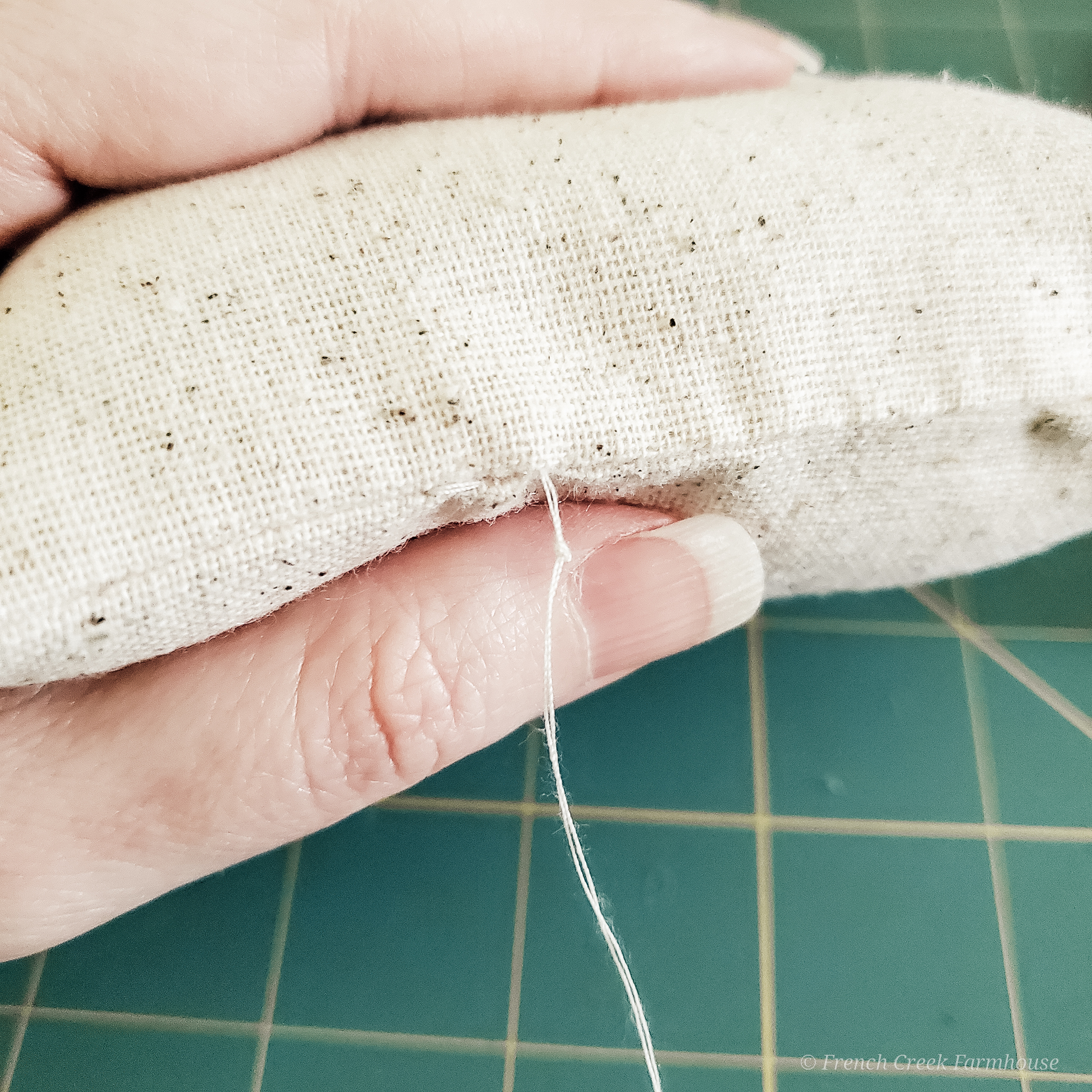 DIY Patriotic Grain Sack Tuck Pillows Step 12: Close seam
