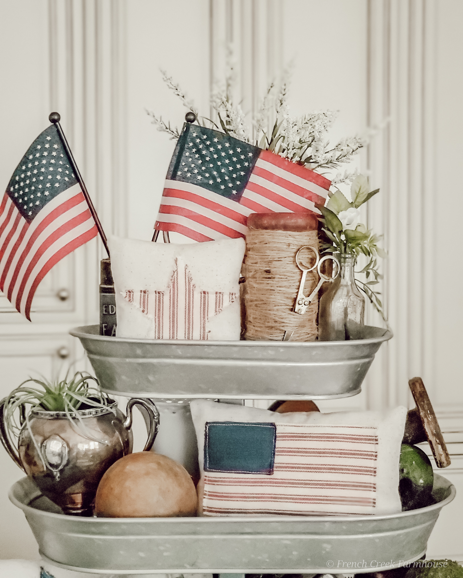 Vintage and American flag decor in a tiered tray