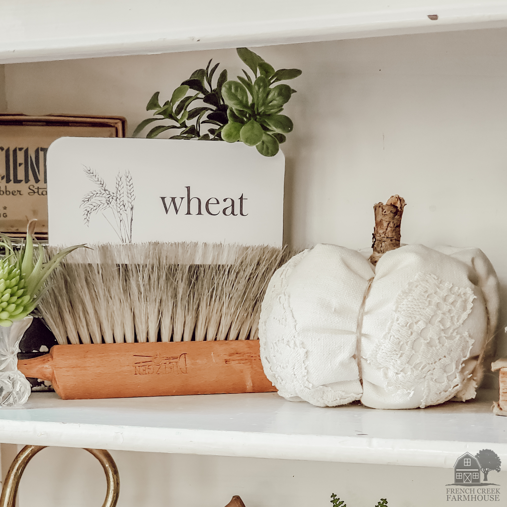 DIY fabric pumpkin as fall farmhouse shelf decor