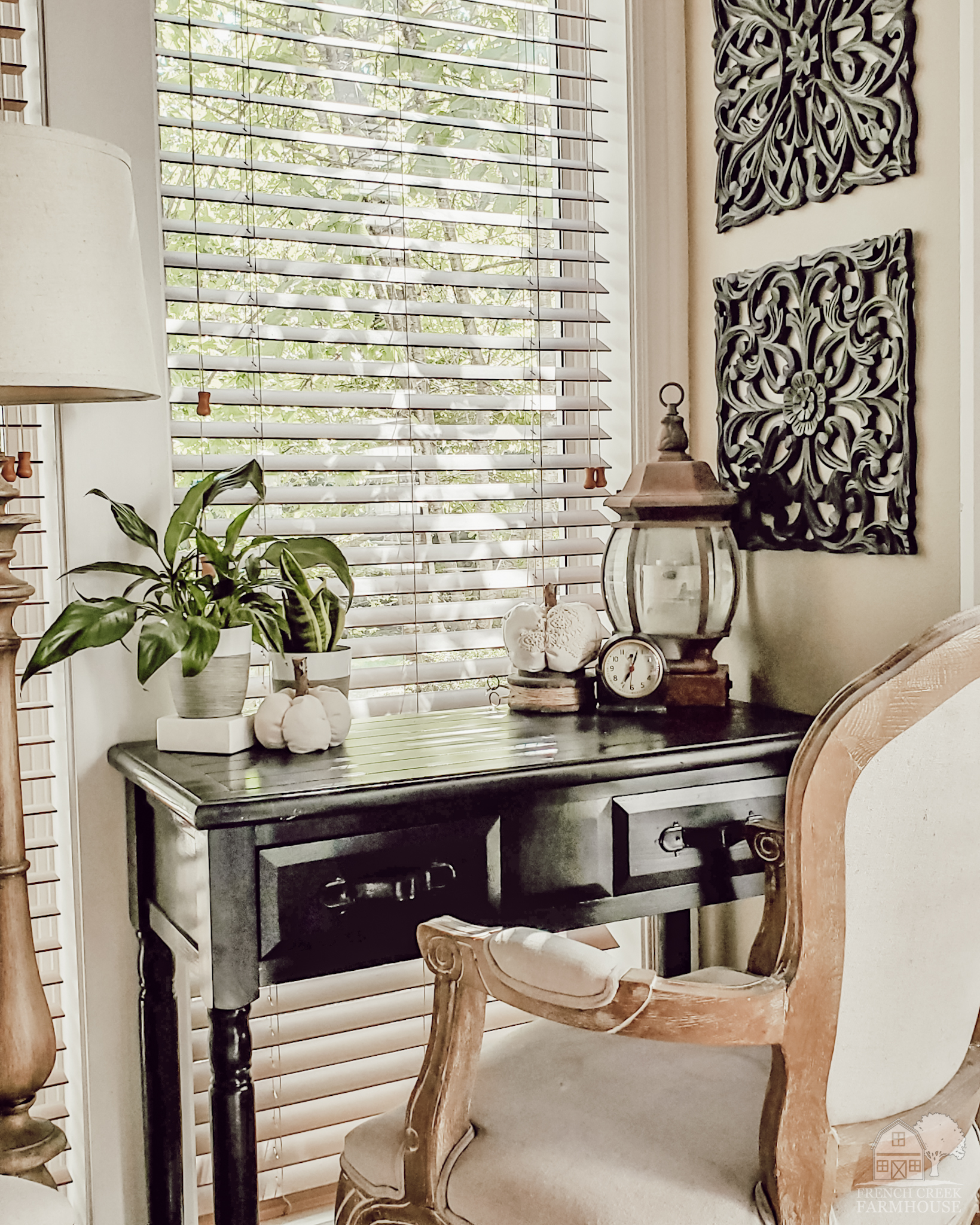 Small fabric pumpkins and neutral decor items adorn my desk