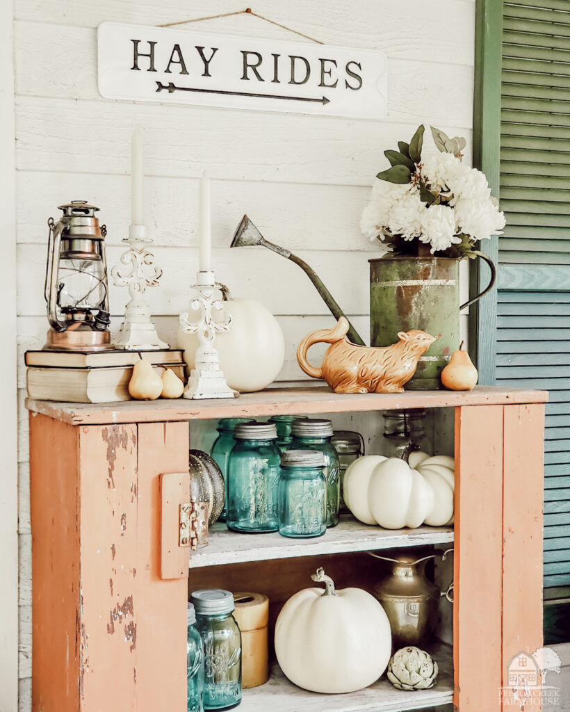 You can decorate for fall on a budget simply by repurposing items you already own and creating autumn-themed vignettes!