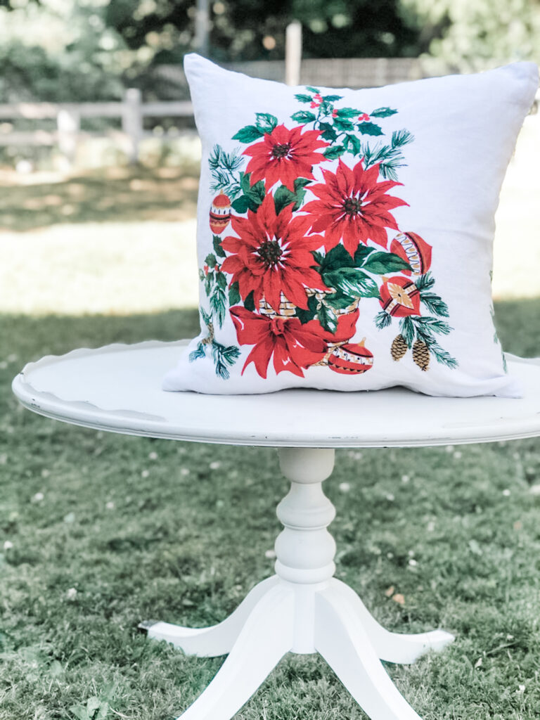 Vintage linen pillow with poinsettias