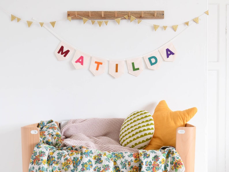A colorful bunting banner is beautiful decor in a child's play room or nursery