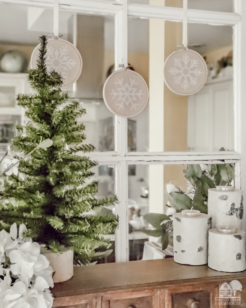 Cross-stitch snowflake ornaments for farmhouse winter decorating