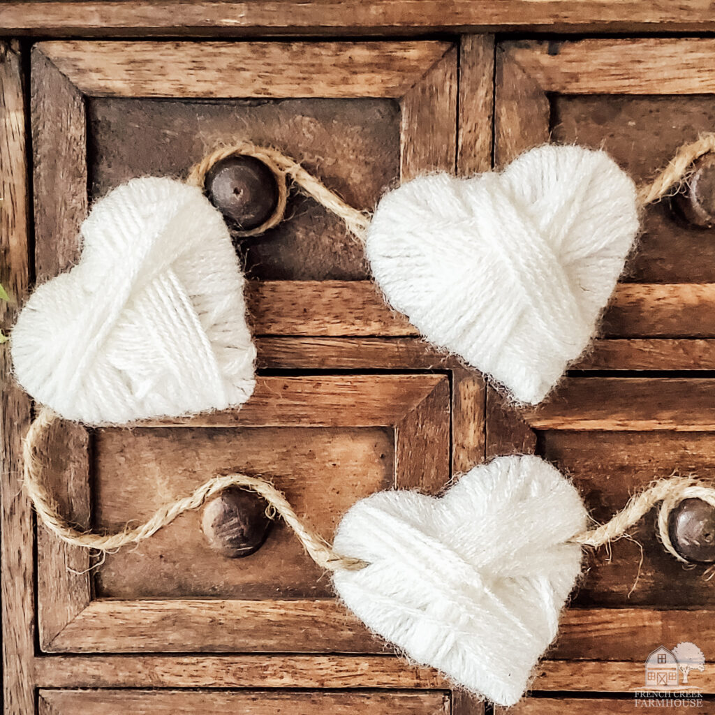 Yarn-wrapped hearts form a garland