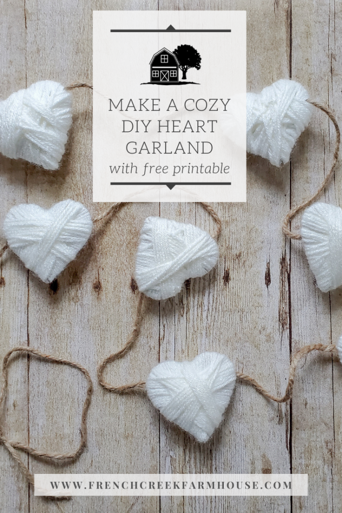 Make this cozy yarn wrapped heart garland! Includes a free printable pattern!
