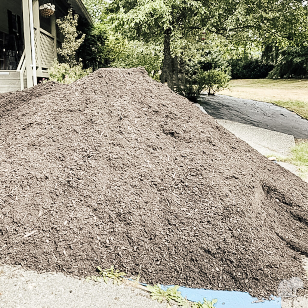 Fine black bark mulch is my favorite for our landscaping beds