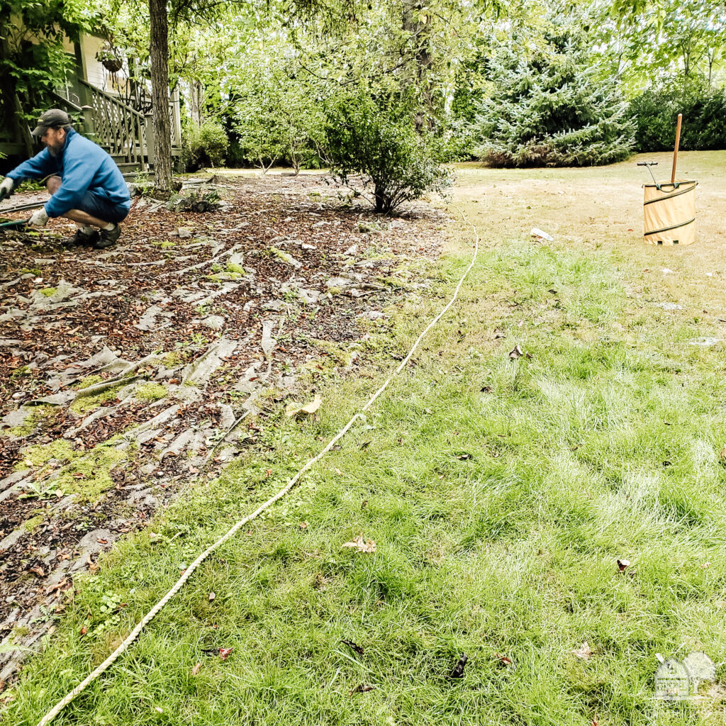 Use a rope to define the boundaries of a new garden bed
