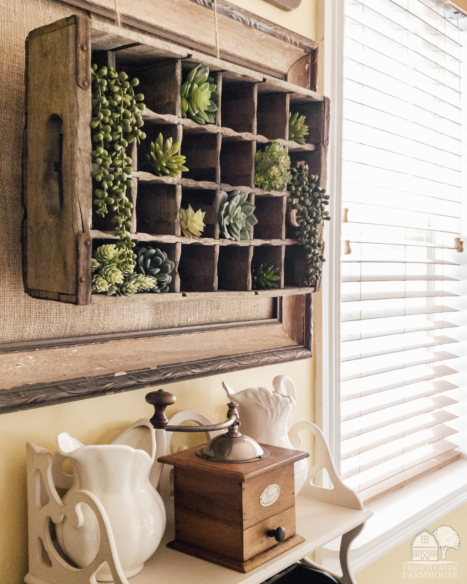 Rustic French Country wall decor with succulents and ironstone pitchers
