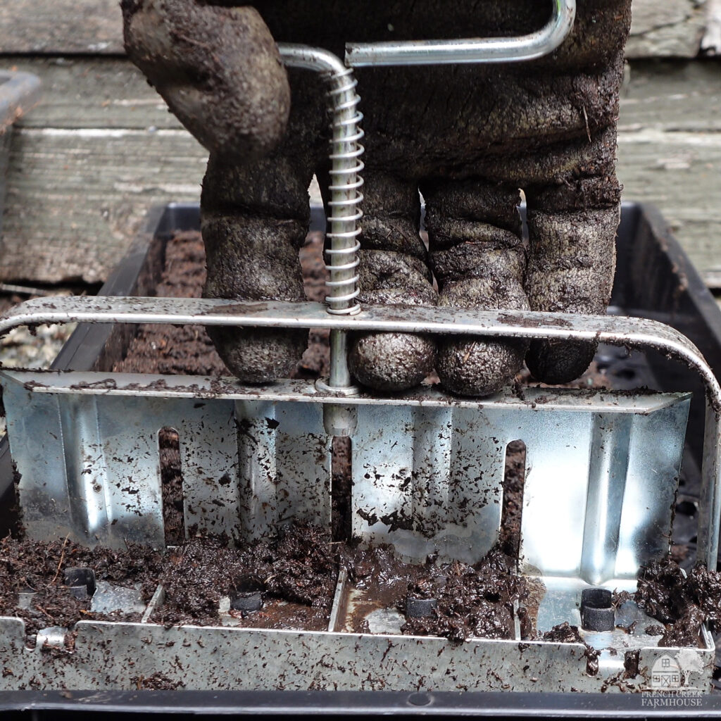 A soil blocker is a simple tool to compress soil into a block for starting seedlings