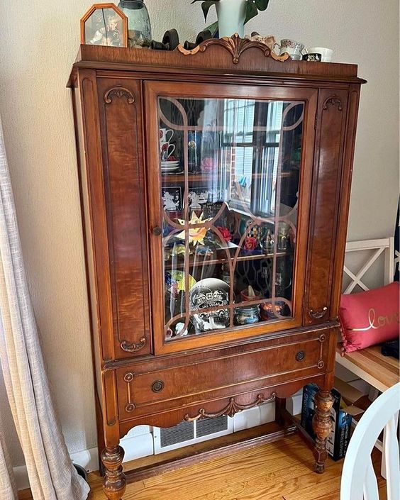 This china cabinet had suffered multiple wounds with damage to the legs as well as missing pieces of trimwork. But with a little vision and perseverance, it is transformed in a gorgeous way.