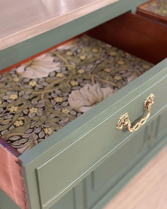 Lining the drawers of refinished furniture with decorative contact paper or wallpaper adds the finishing touch to your hard work!