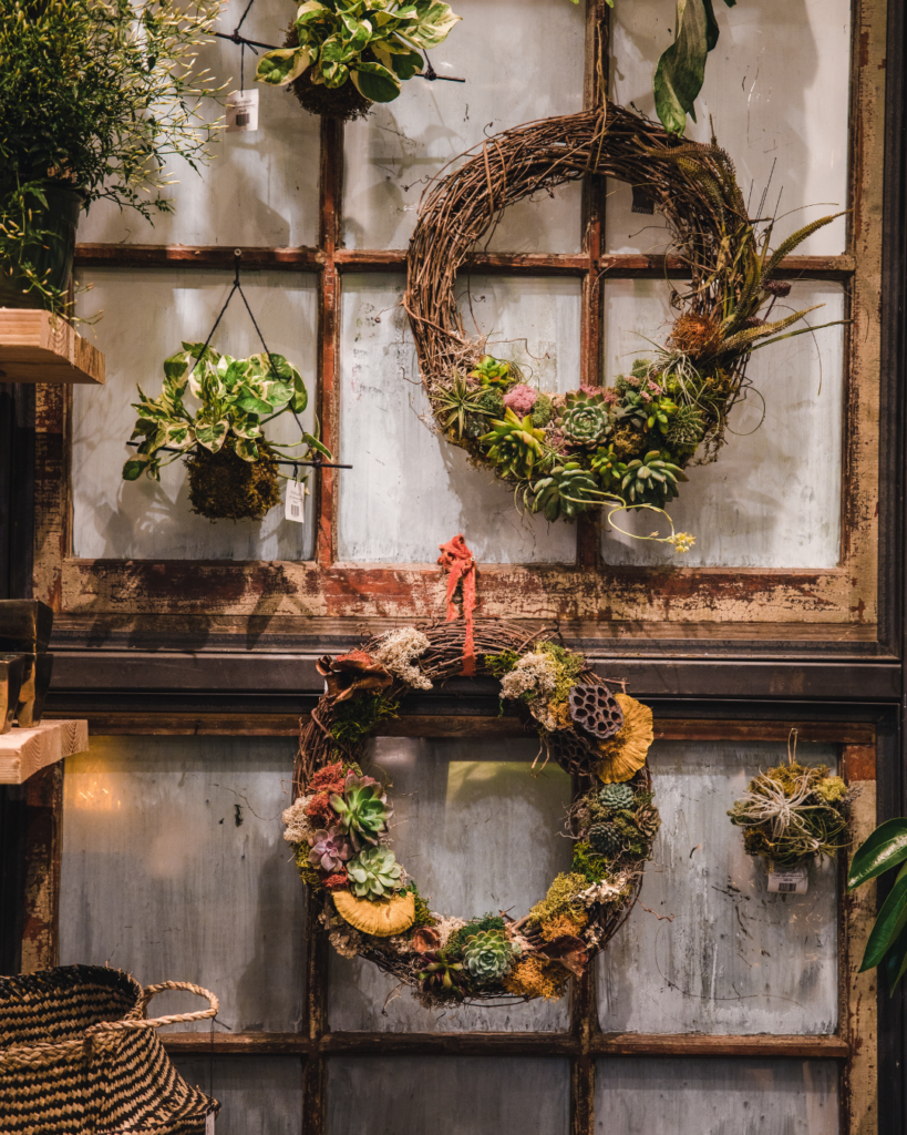 Botanical decor, like autumn wreaths, make fall feel especially cozy.