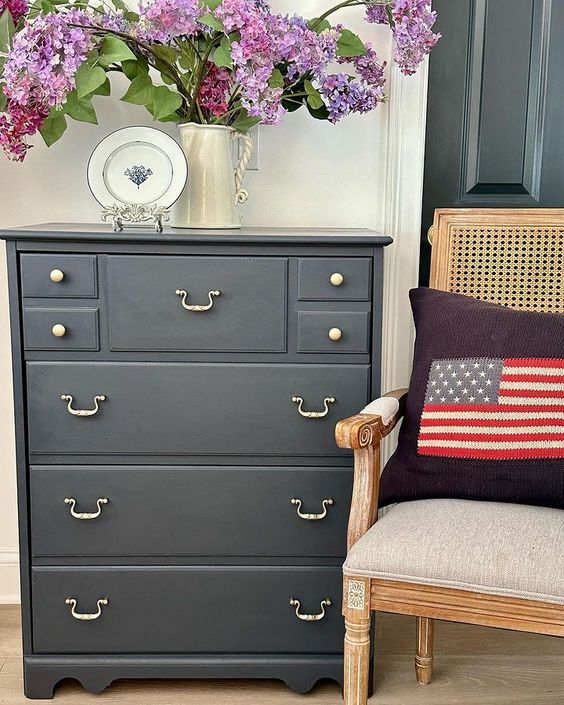 A coat of navy blue paint is a classic and elegant finish for a simple dresser.