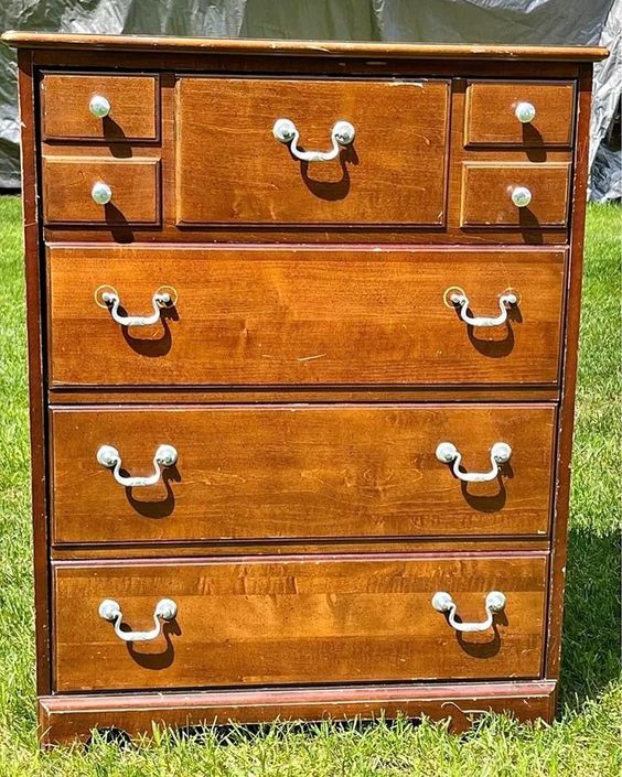 This is a vintage, but not antique, dresser. It's not crafted from especially high quality wood which makes it perfect for a painting project that can completely transform the look.