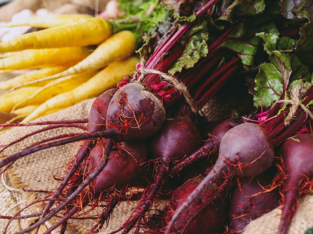 Root vegetables, like carrots and beets, will give their best flavor when grown over winter in cool conditions.