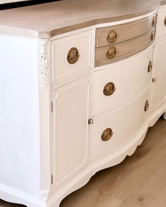 Sanded to bare wood and updated with paint, this sideboard now looks fabulous!