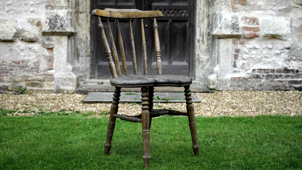 Refinishing wood furniture, like an antique chair, helps to preserve our history.