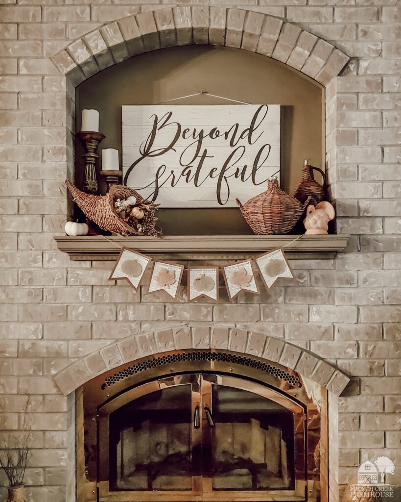 This year, it was my goal to create a Thanksgiving mantel that whispers of nostalgia, exudes rustic elegance, and wraps our home in the soft embrace of vintage charm.