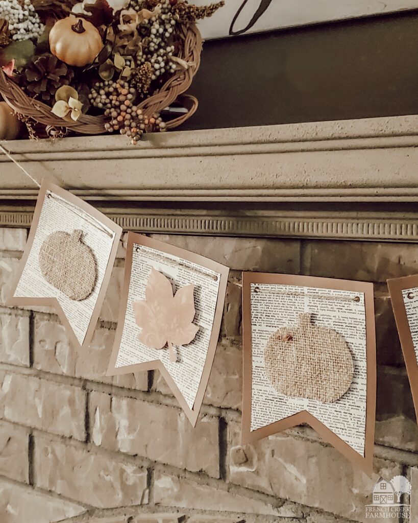 For our Thanksgiving mantel, I crafted a DIY autumn bunting banner in neutral tones.