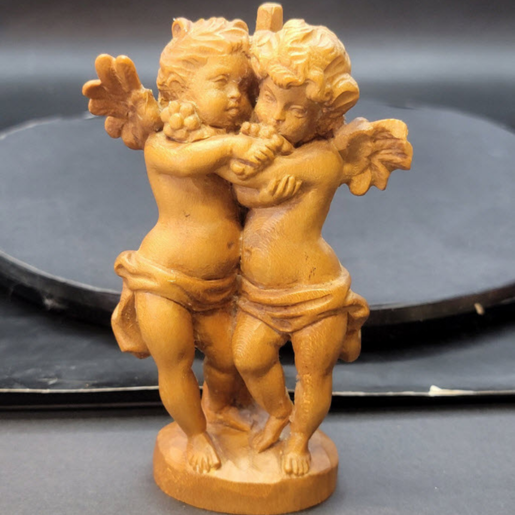 Vintage wooden cherub figurine