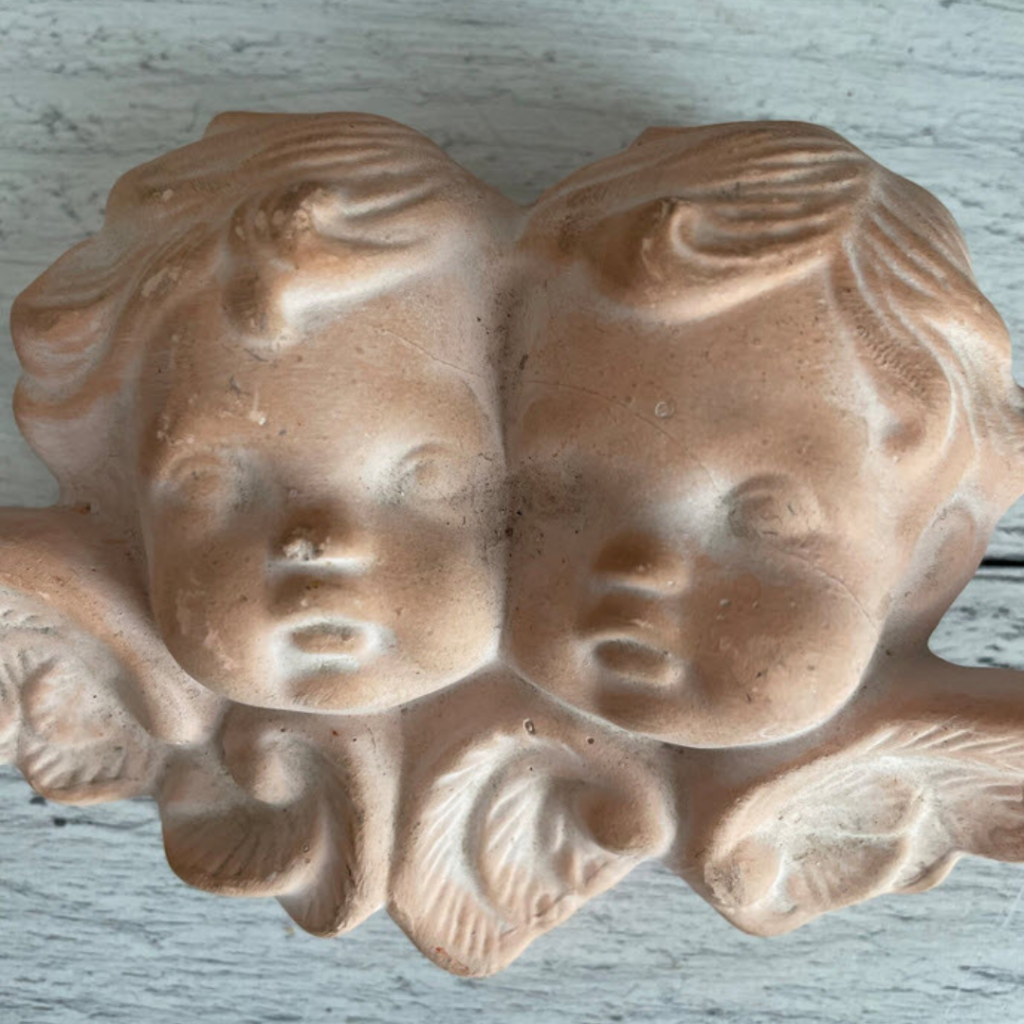 Vintage terracotta cherubs